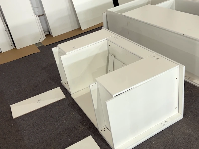 Trial assembly of custom cabinet boxes before delivery preparation